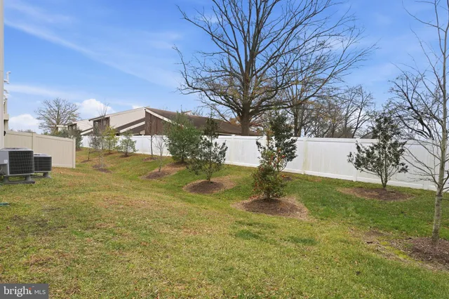 a view of backyard with outdoor space
