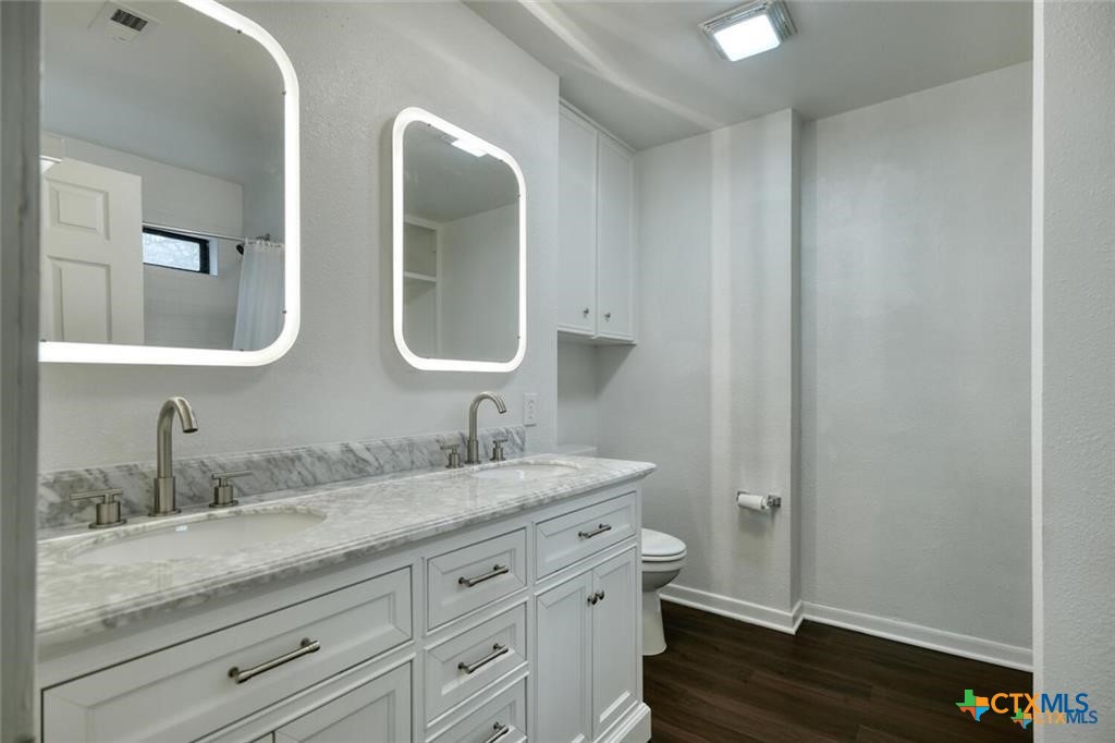 1529 North Colorado Street Lockhart, TX 78644 - Photo 8 of 14 Primary bath with double vanity