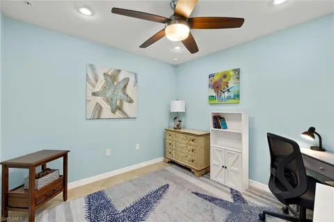 a view of workspace with painting on the wall