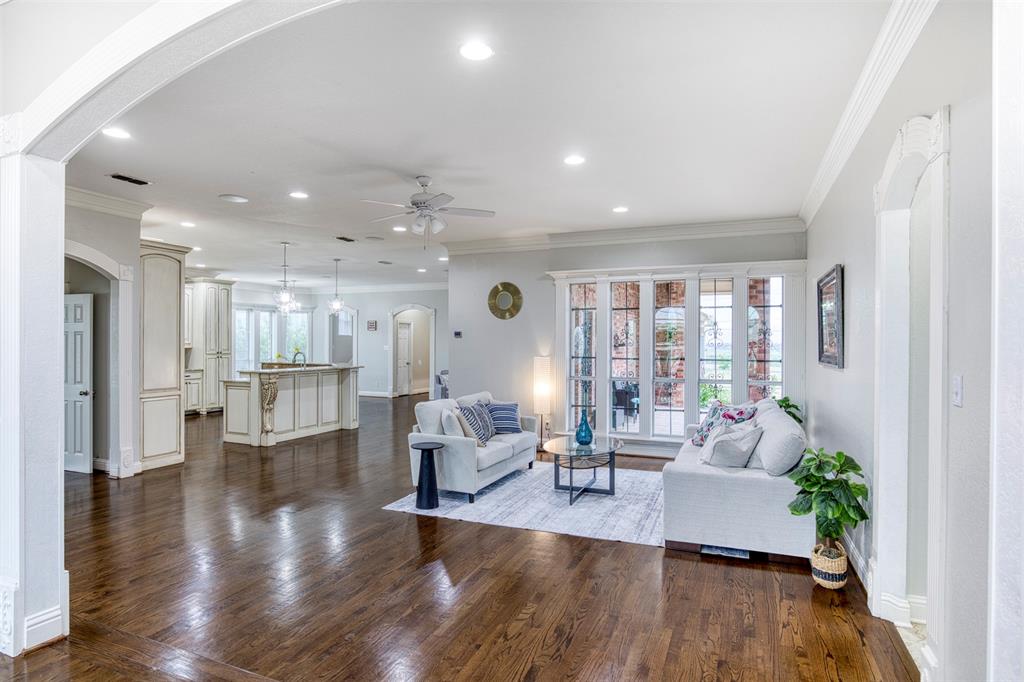 124 Lonesome Trail Haslet, TX 76052 - Photo 12 of 40 a living room with furniture wooden floor and a large window