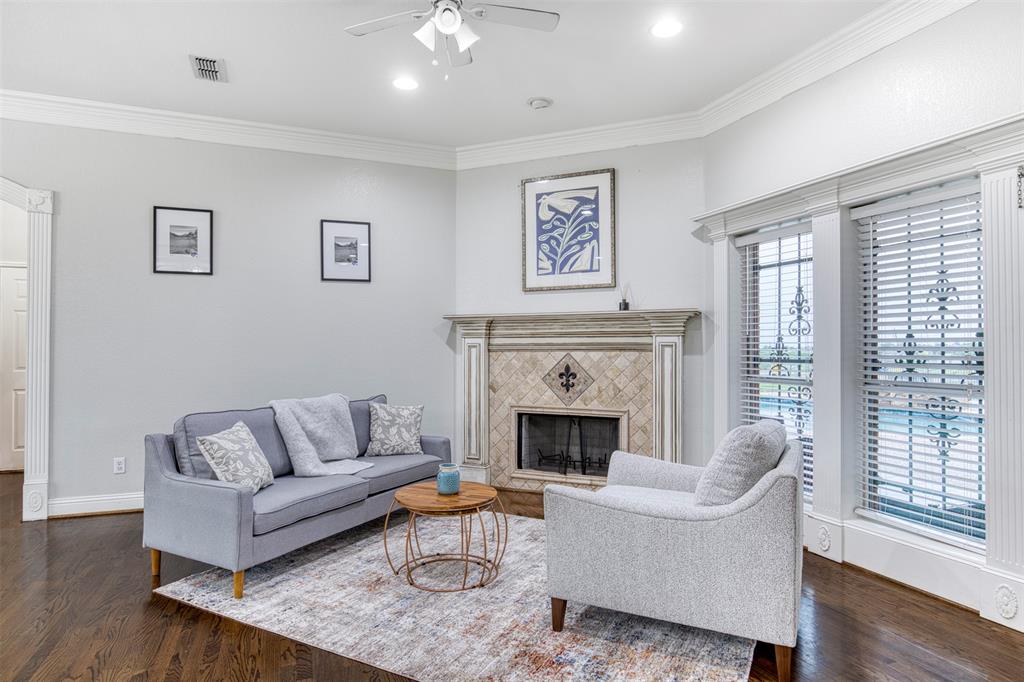 124 Lonesome Trail Haslet, TX 76052 - Photo 20 of 40 a living room with furniture and a fireplace