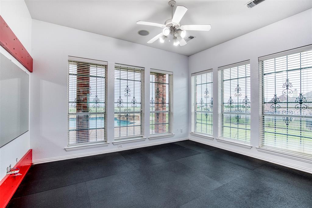 124 Lonesome Trail Haslet, TX 76052 - Photo 21 of 40 a view of an empty room with a window