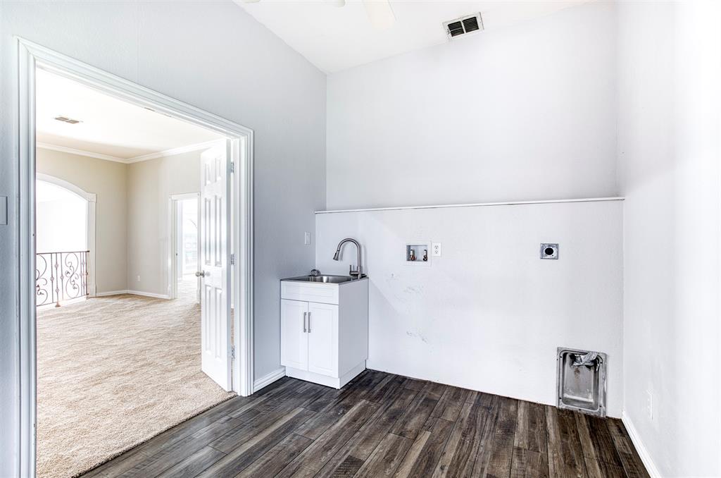 124 Lonesome Trail Haslet, TX 76052 - Photo 37 of 40 a view of empty room with wooden floor