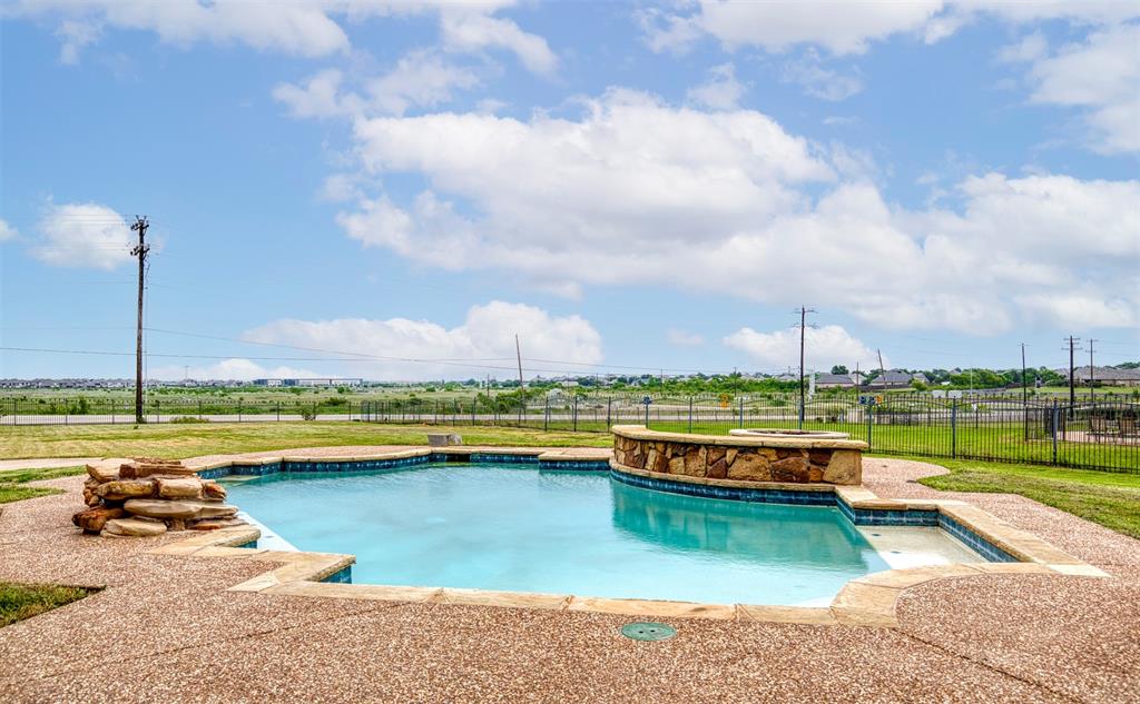124 Lonesome Trail Haslet, TX 76052 - Photo 39 of 40 a view of swimming pool with outdoor seating space and barbeque oven