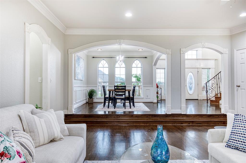 124 Lonesome Trail Haslet, TX 76052 - Photo 8 of 40 a living room with furniture and a large mirror