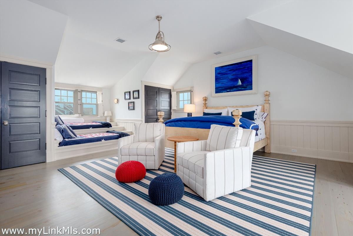 37 Sankaty Head Road Nantucket, MA 02554 - Photo 32 of 65 a living room with furniture and a wooden floor