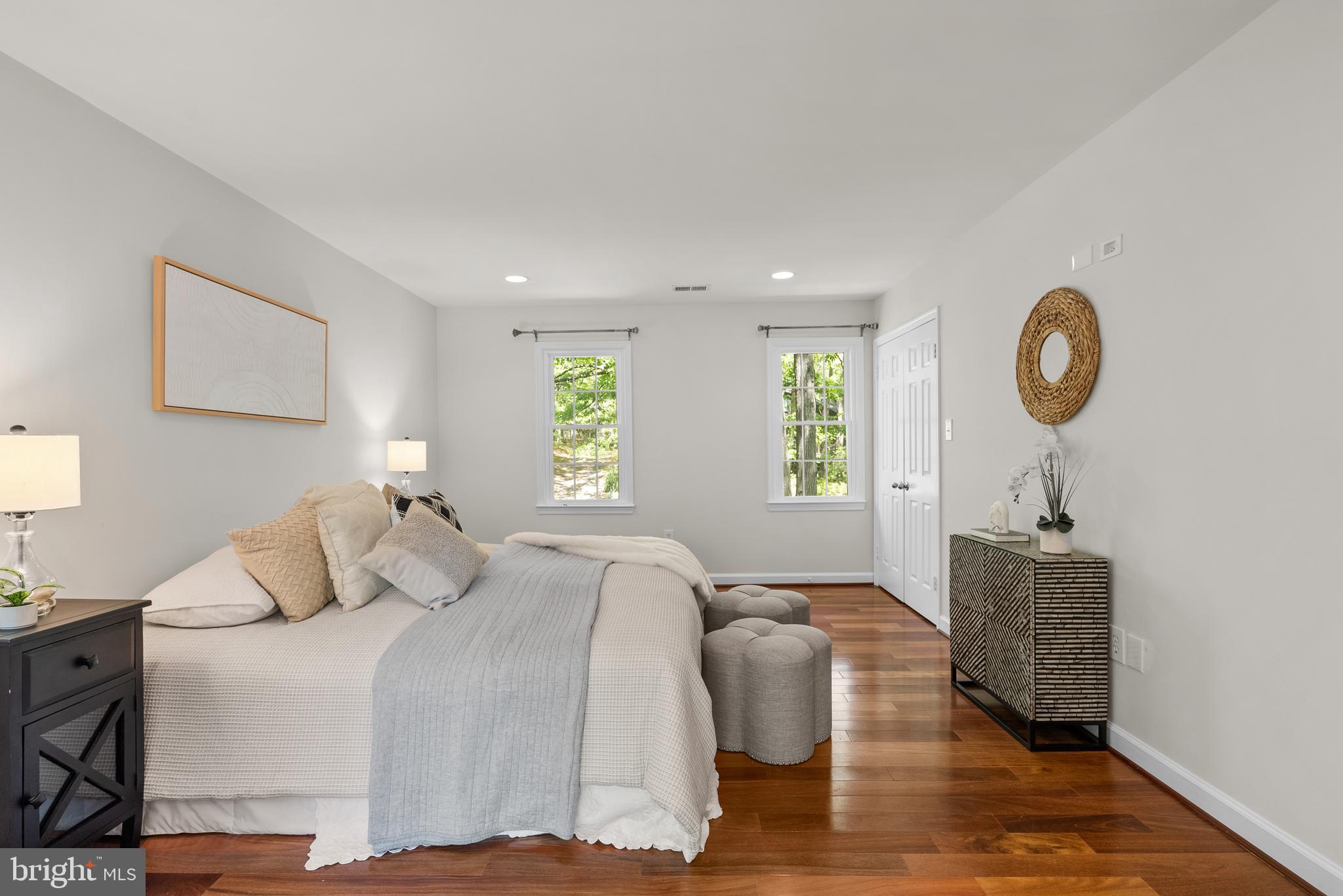 10717 Midsummer Drive Reston, VA 20191 - Photo 14 of 35 a bedroom with a bed and a window