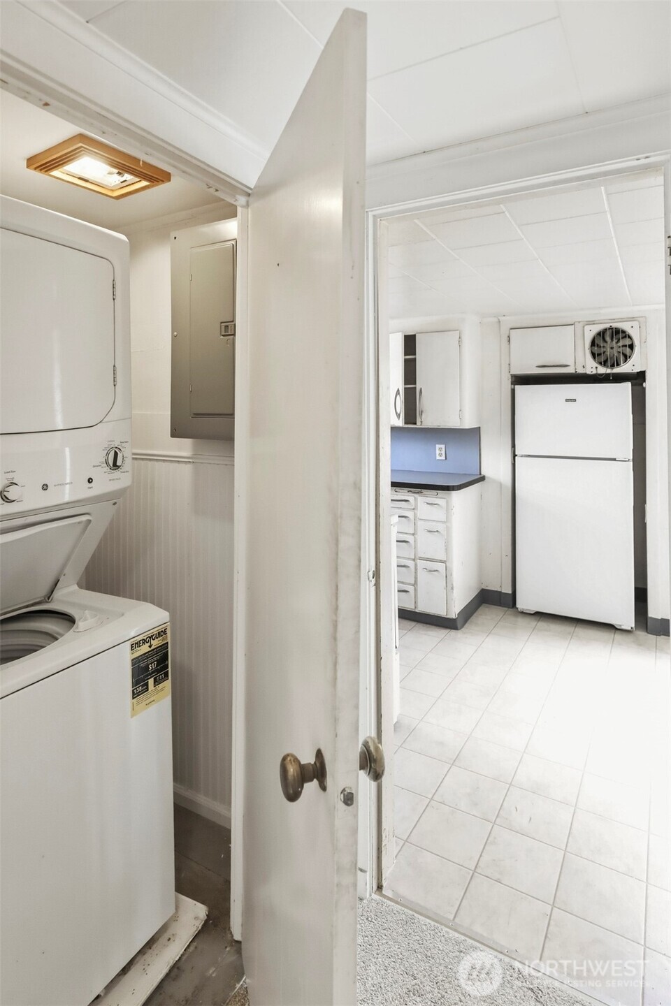 1817 34th Street Everett, WA 98201 - Photo 14 of 19 a view of a storage and utility room with washer and dryer