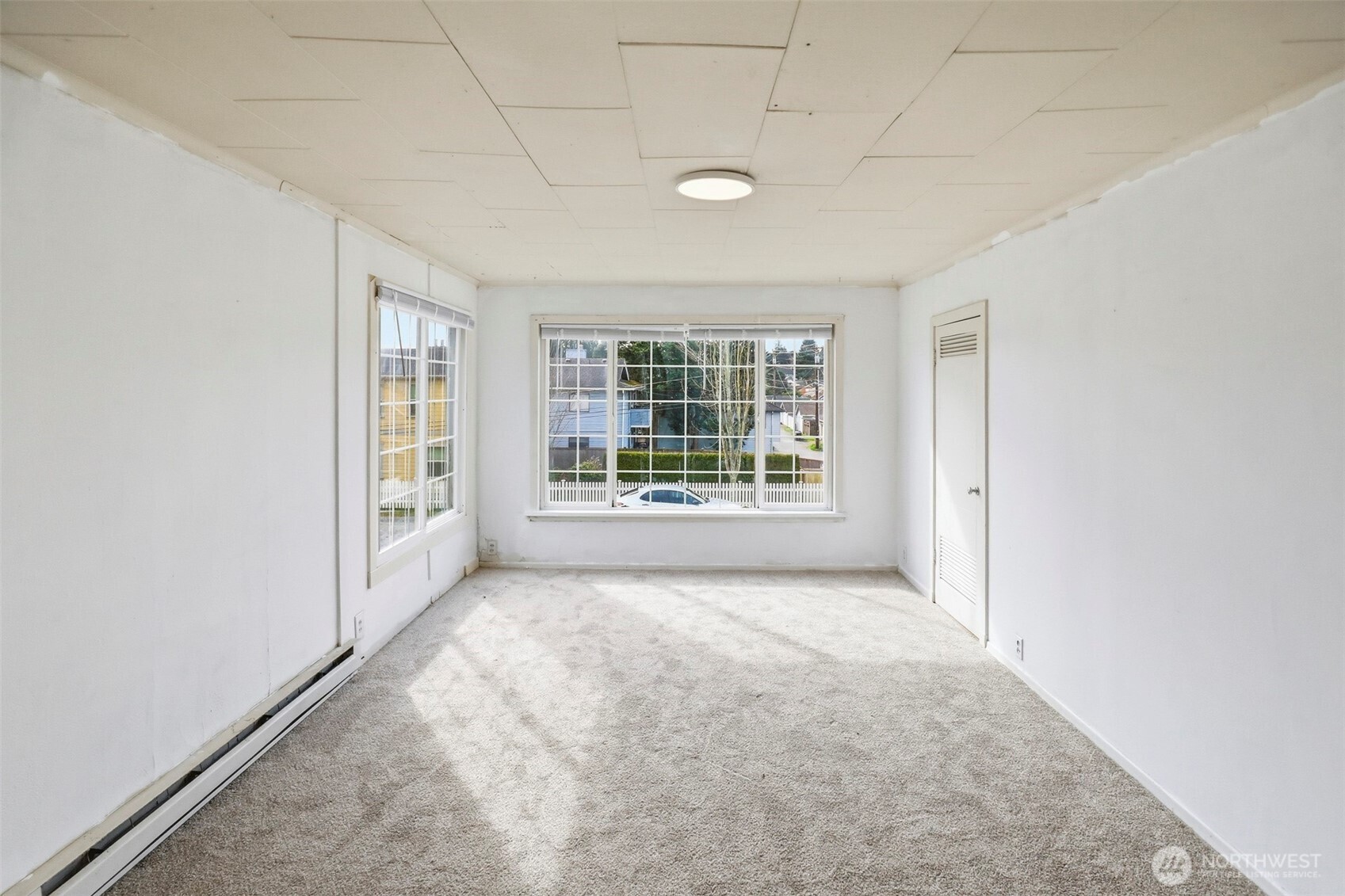 1817 34th Street Everett, WA 98201 - Photo 8 of 19 an empty room with windows