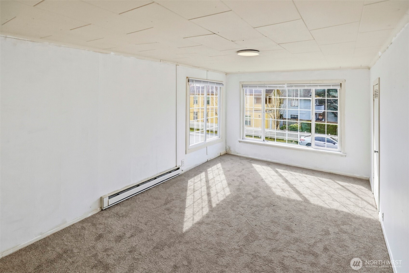 1817 34th Street Everett, WA 98201 - Photo 9 of 19 an empty room with windows