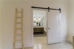 a view of a bathroom from the hallway