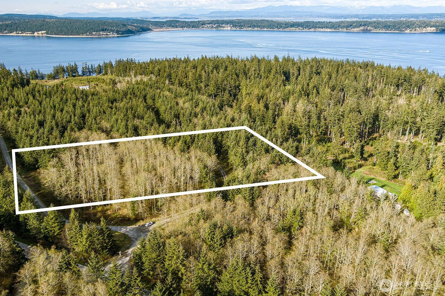 16 Water Vw Road Langley, WA 98260 - Photo 3 of 5 a view of a lake from a balcony