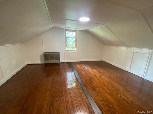 72 North Liberty Drive, Unit 2 Stony Point, NY 10980 - Photo 6 of 12 an empty room with wooden floor and windows