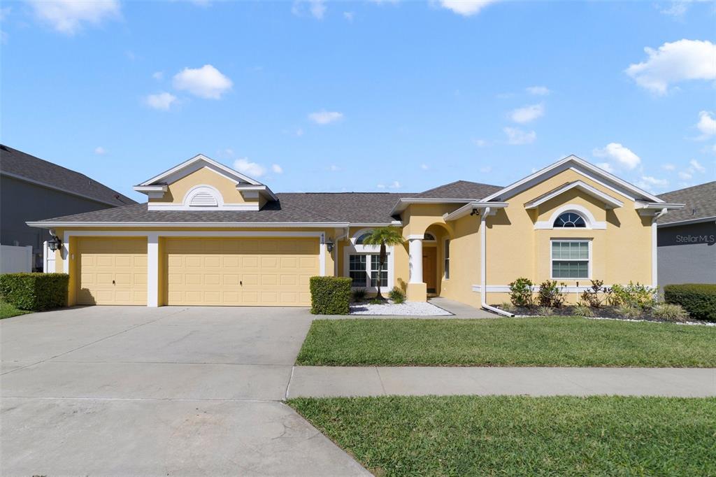 419 Coventry Road Davenport, FL 33897 - Photo 1 of 1 a view of house with yard and entertaining space