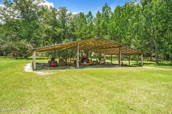 a view of a lake with a big yard