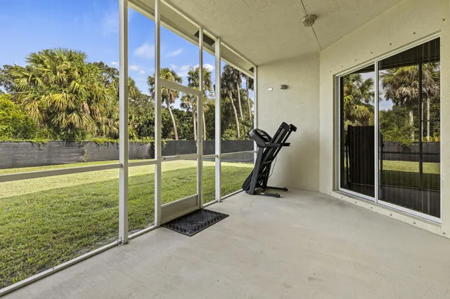 a view of a room with a large window