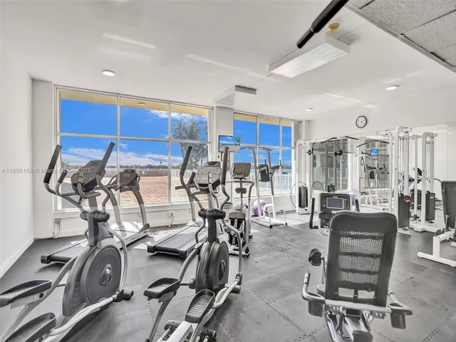 a very nice looking room with furniture and a window