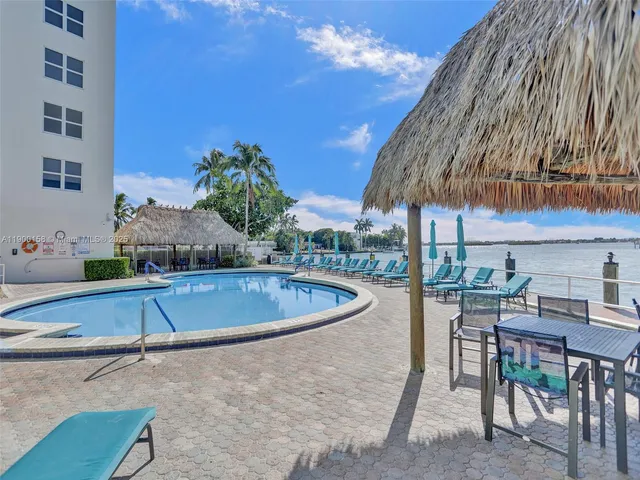 a view of a swimming pool with a terrace