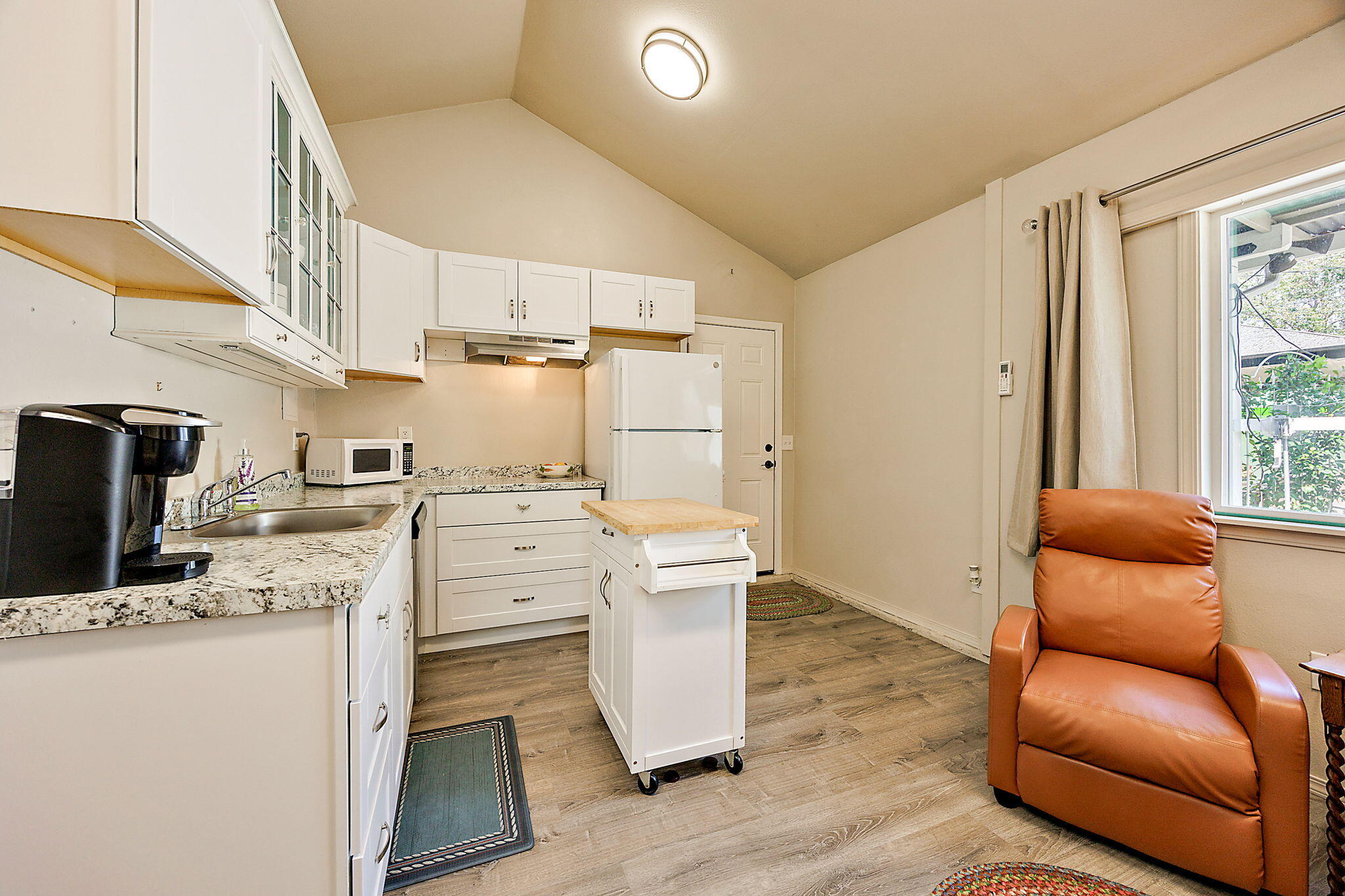 3744 Colver Road Phoenix, OR 97535 - Photo 51 of 58 a kitchen with a refrigerator stove and sink