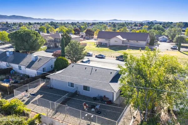 an aerial view of a house with a garden