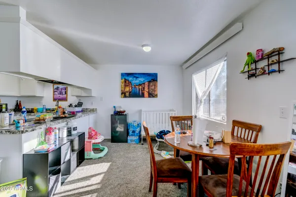 a view of a workspace with furniture