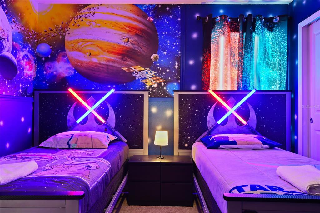 4428 Kaipo Road Davenport, FL 33897 - Photo 34 of 73 a view of a gallery with a yard