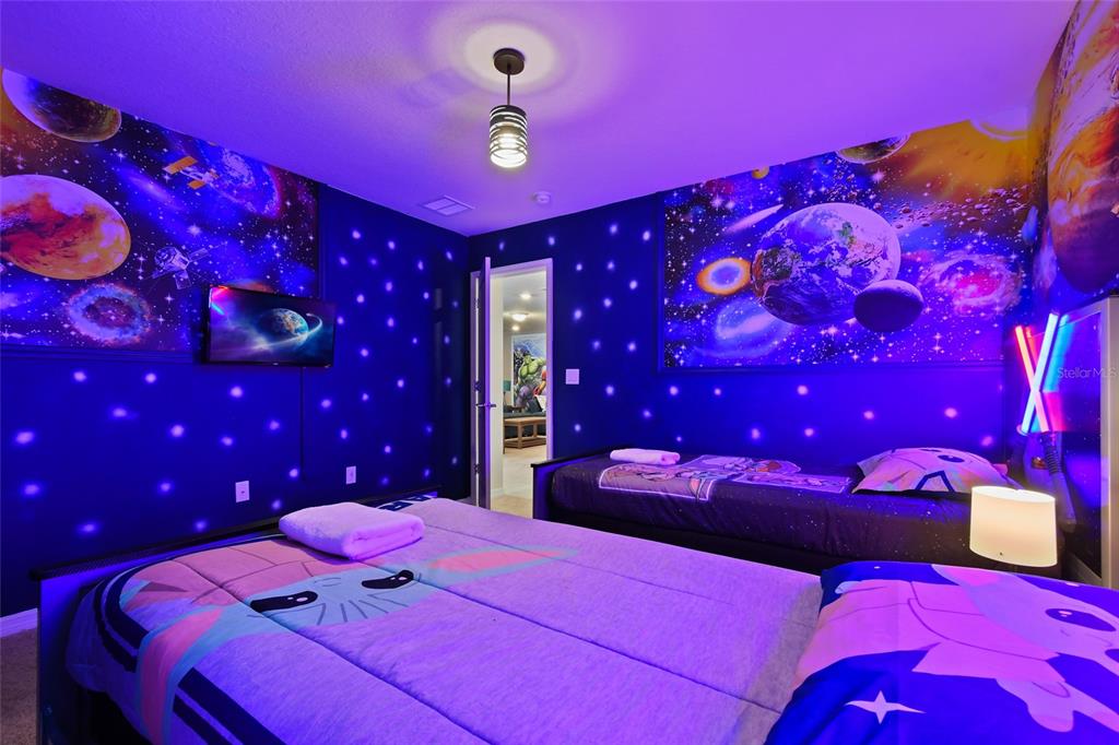 4428 Kaipo Road Davenport, FL 33897 - Photo 35 of 73 a bedroom with a bed and a closet