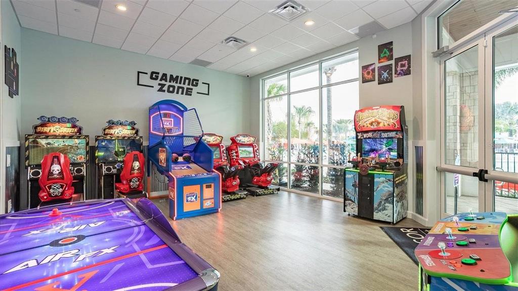4428 Kaipo Road Davenport, FL 33897 - Photo 61 of 73 a living room with furniture a rug and a large window