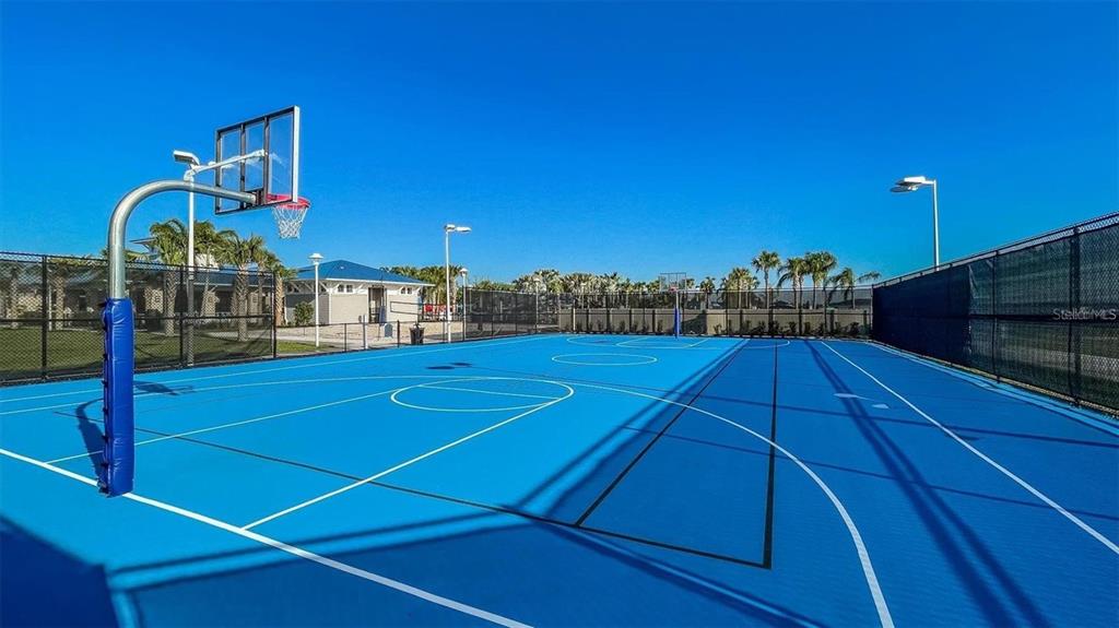 4428 Kaipo Road Davenport, FL 33897 - Photo 63 of 73 a view of a tennis court