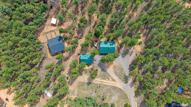 an aerial view of residential house with outdoor space