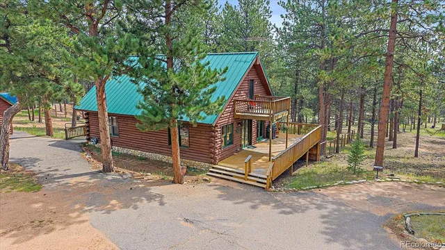 a house with trees in front of it