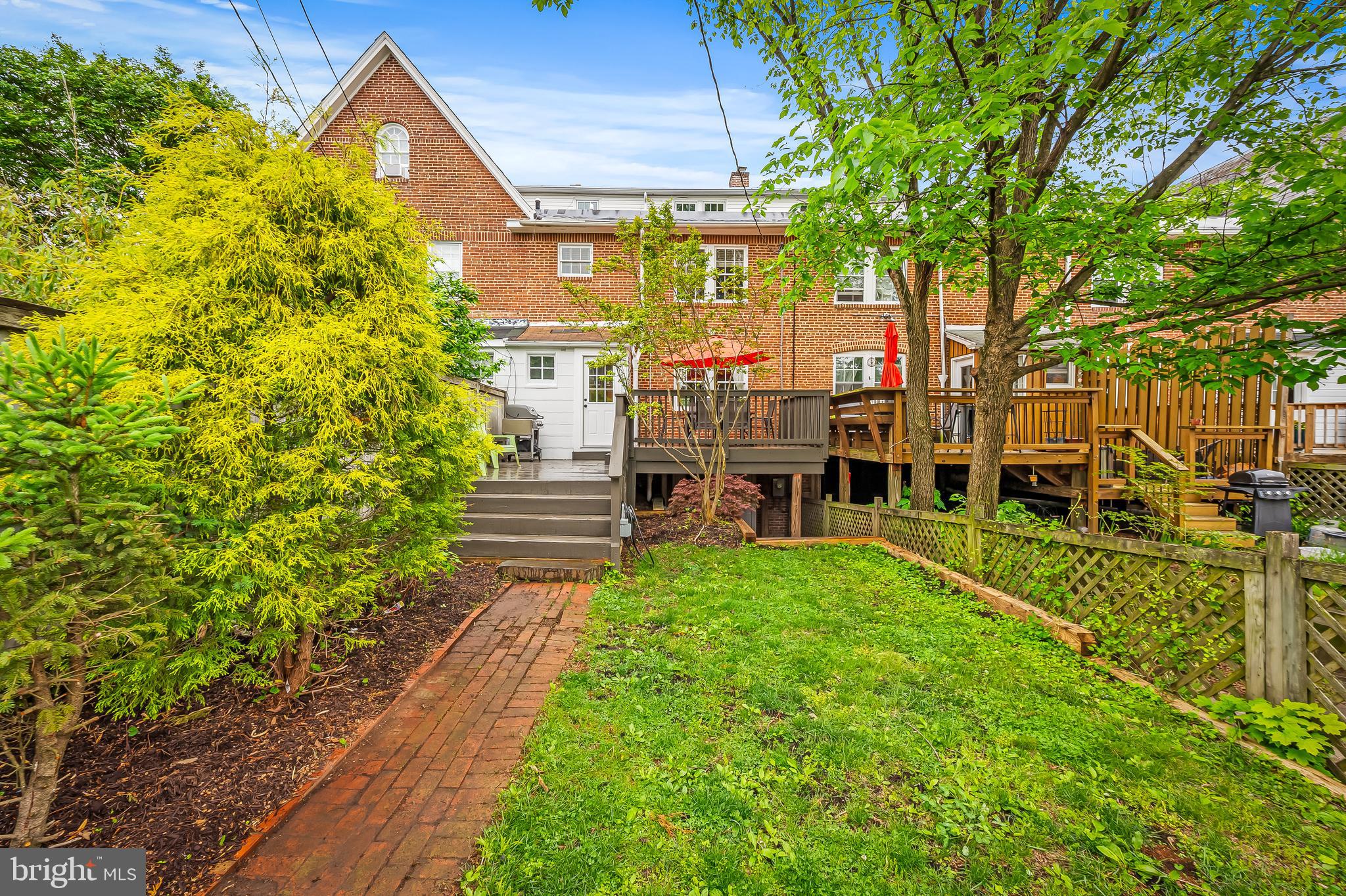 4308 Roland Avenue Baltimore, MD 21210 - Photo 31 of 34 a view of a house with a yard