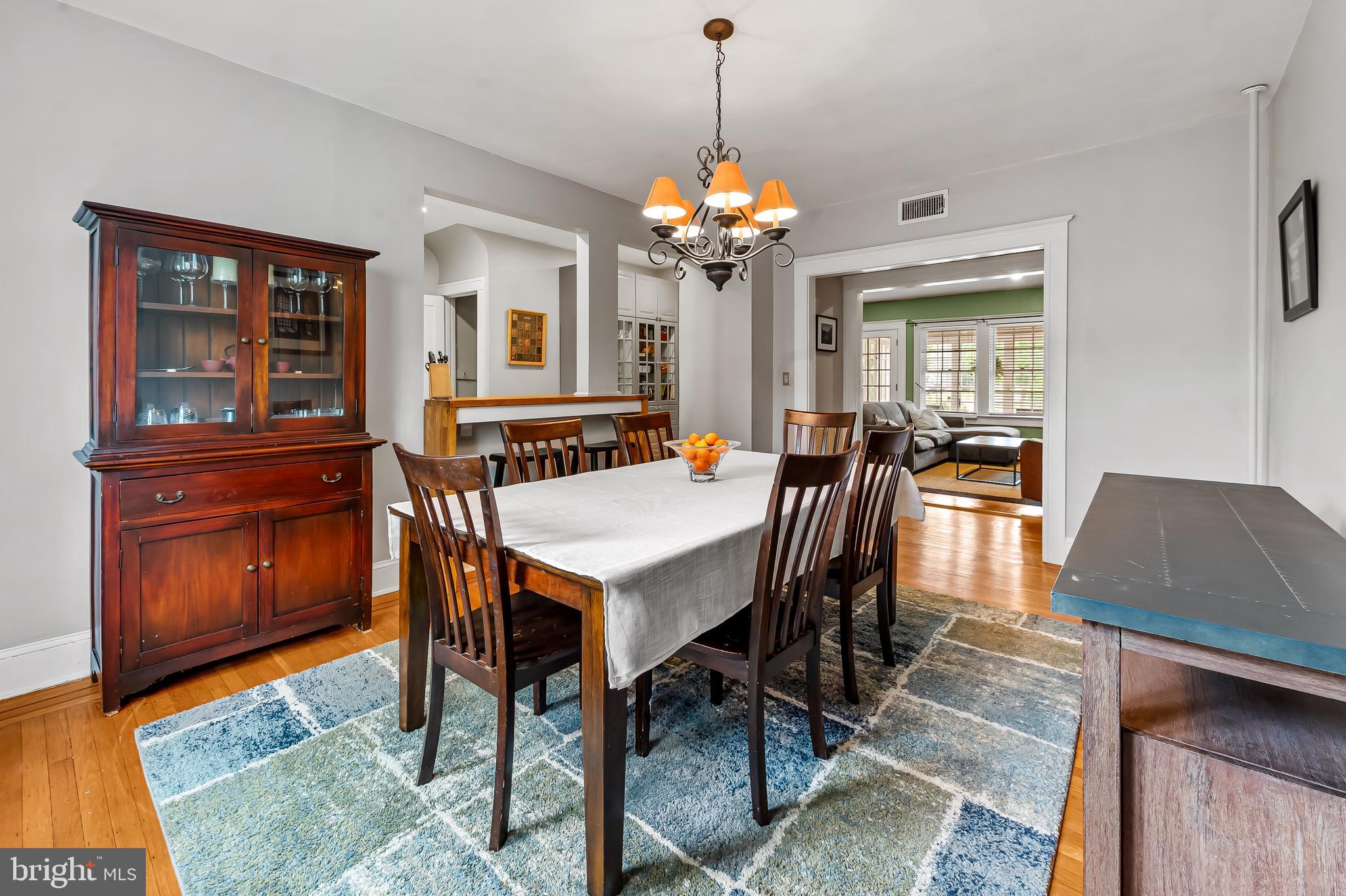 4308 Roland Avenue Baltimore, MD 21210 - Photo 7 of 34 a view of a dining room with furniture window and wooden floor