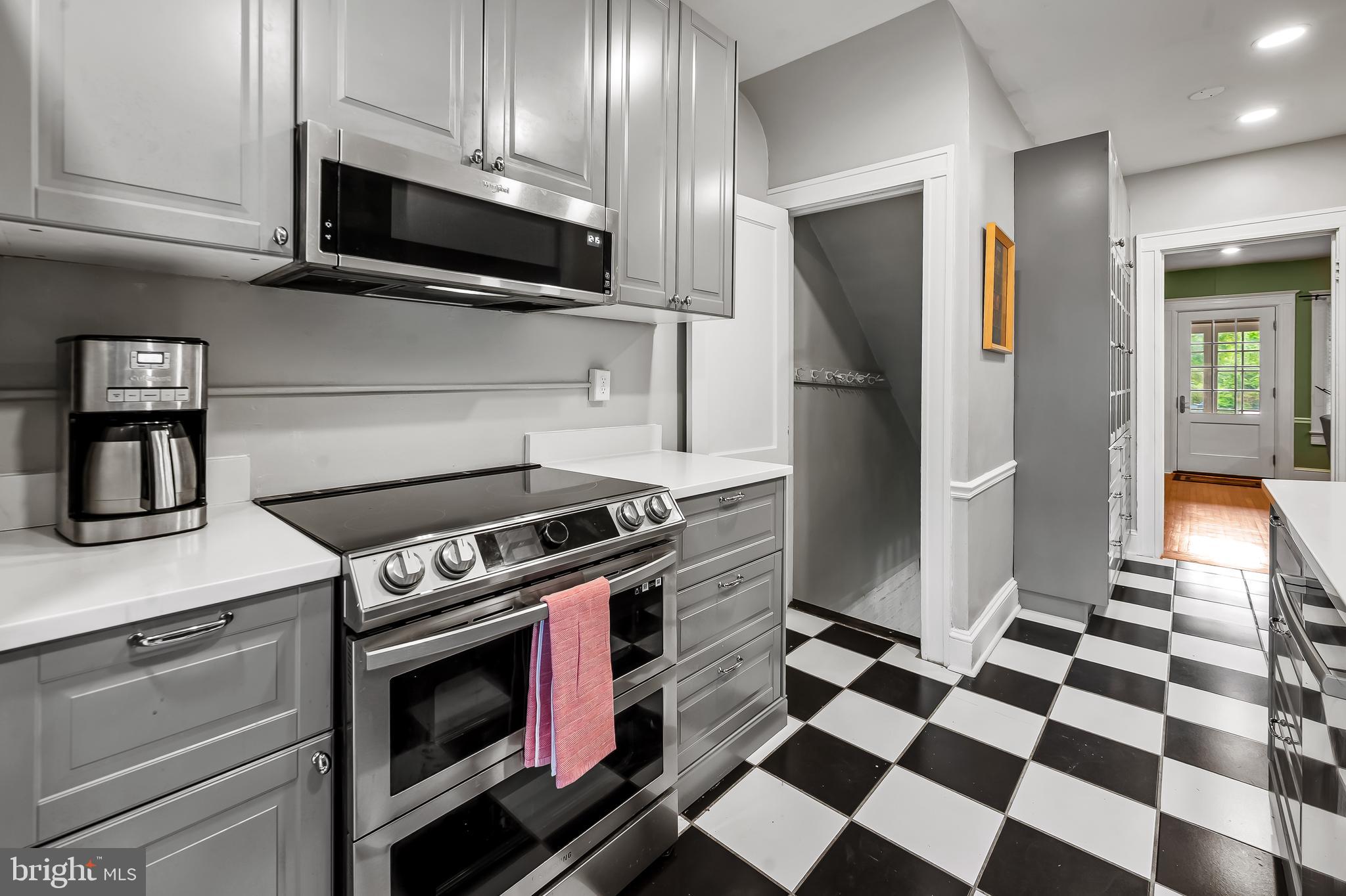 4308 Roland Avenue Baltimore, MD 21210 - Photo 10 of 34 a kitchen with stainless steel appliances and cabinets