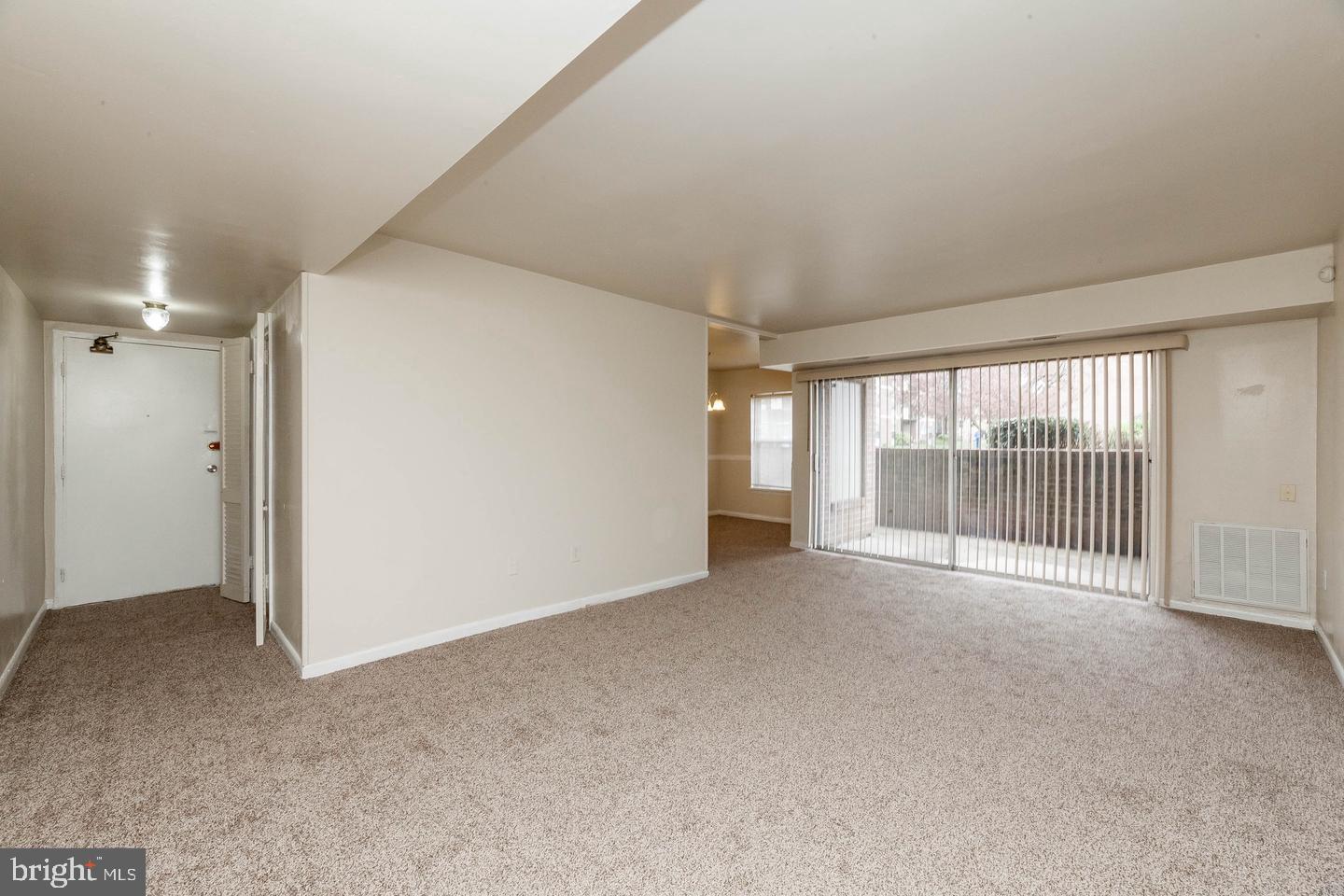 3827 St Barnabas Road, Unit T Suitland, MD 20746 - Photo 11 of 15 Spacious, light-filled living area.