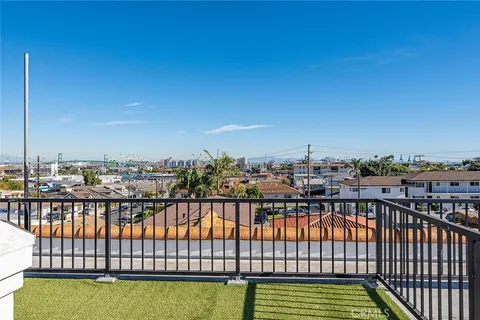 a view of city from a balcony