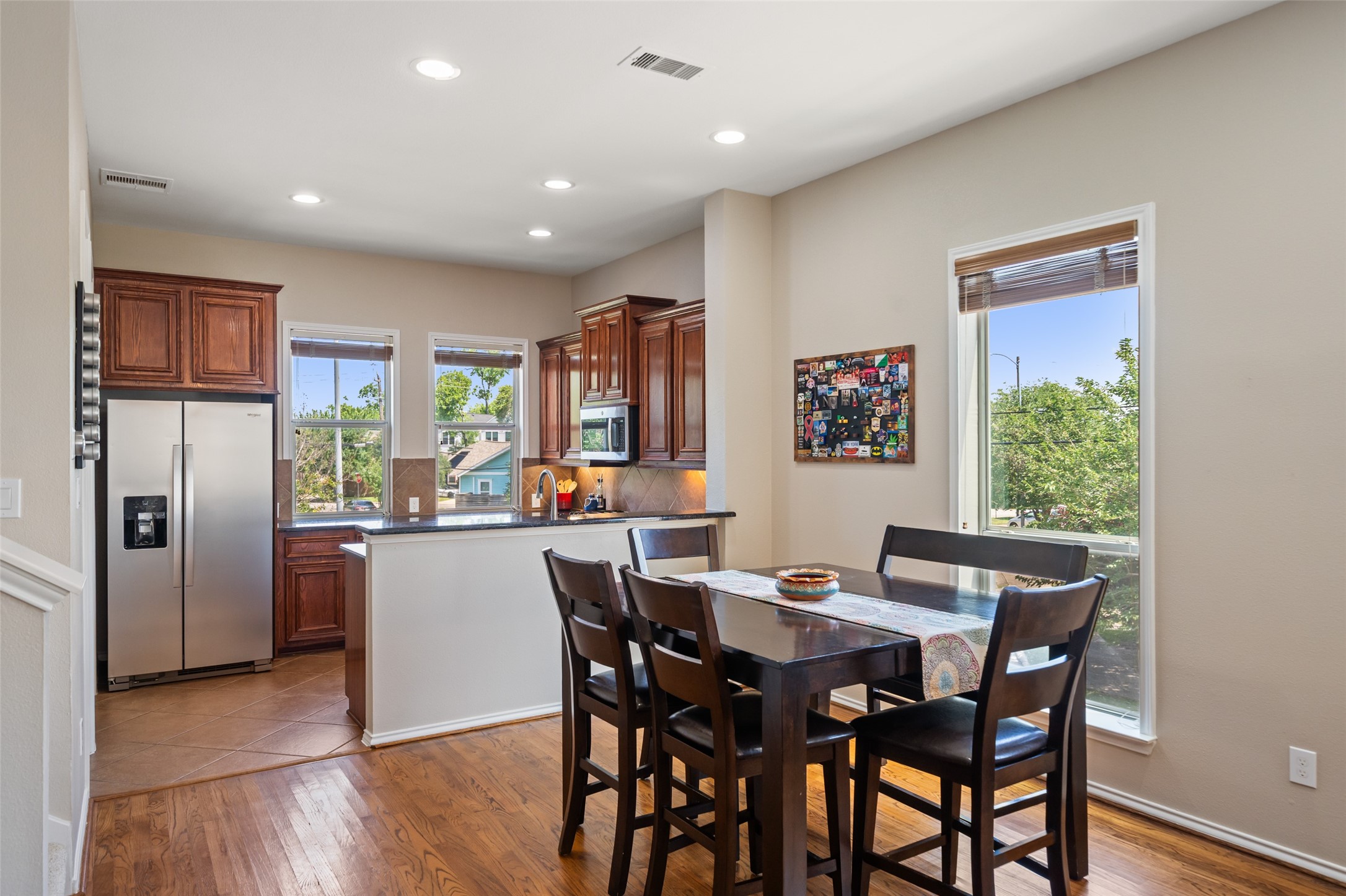 2613 Link Road Houston, TX 77009 - Photo 15 of 28 The dining area is adjacent to the kitchen with a breakfast bar.