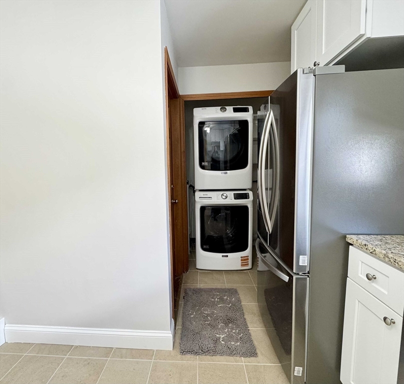 42 Chester Road, Unit 1 Belmont, MA 02478 - Photo 4 of 22 a view of a hallway with washer and dryer