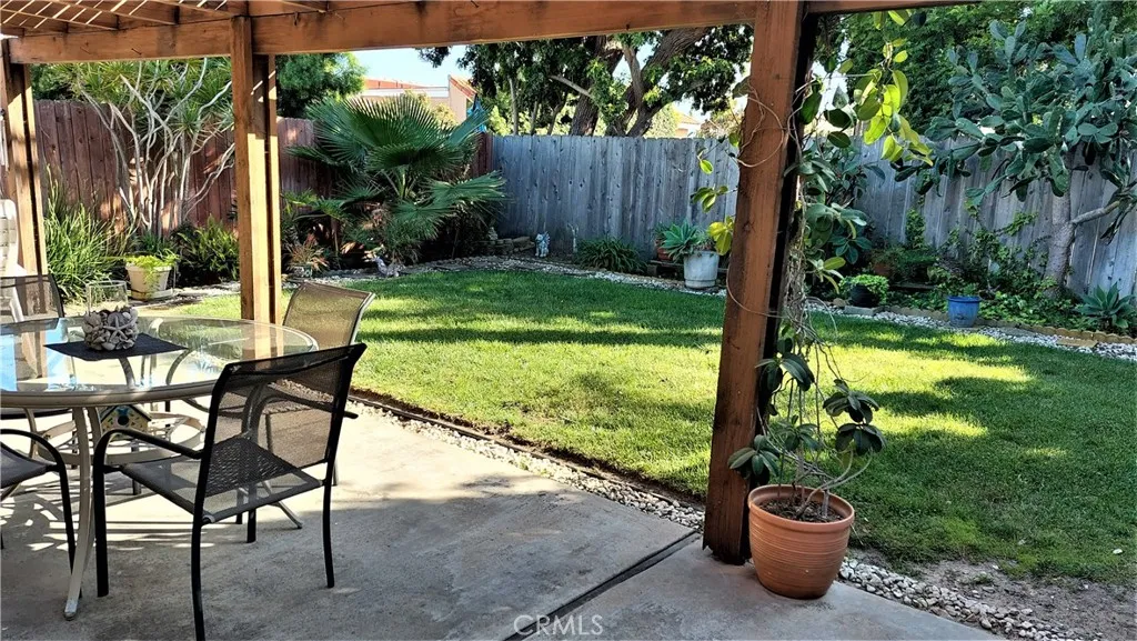 34529 Via Verde Dana Point, CA 92624 - Photo 14 of 18 a view of a chair and table in backyard of the house