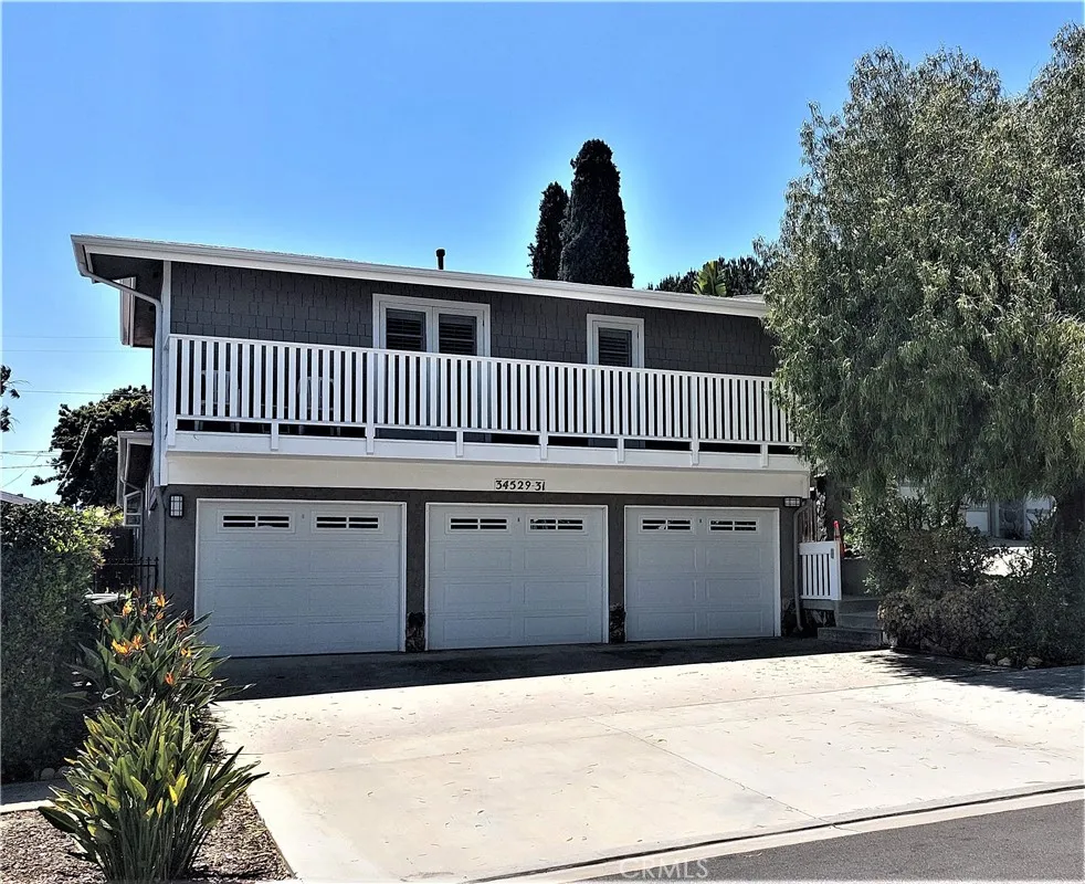 34529 Via Verde Dana Point, CA 92624 - Photo 18 of 18 a front view of a house with a yard
