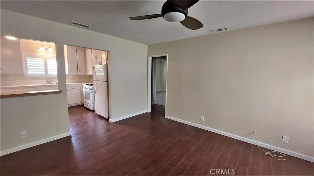 34529 Via Verde Dana Point, CA 92624 - Photo 5 of 18 wooden floor in an empty room with a window