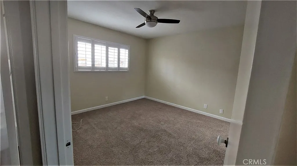 34529 Via Verde Dana Point, CA 92624 - Photo 8 of 18 an empty room with windows and fan