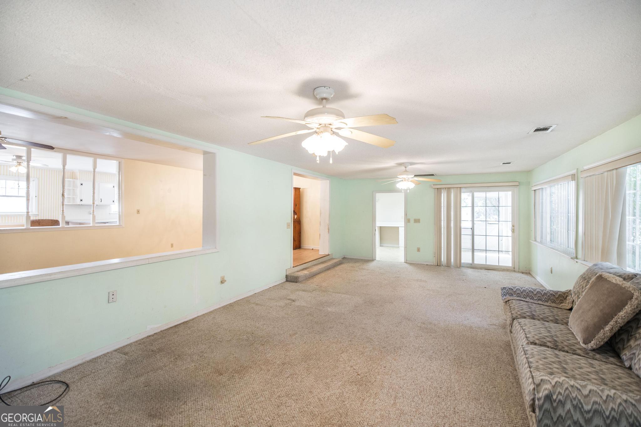 1739 Houston Lake Road Perry, GA 31069 - Photo 18 of 34 a view of an empty room with a window