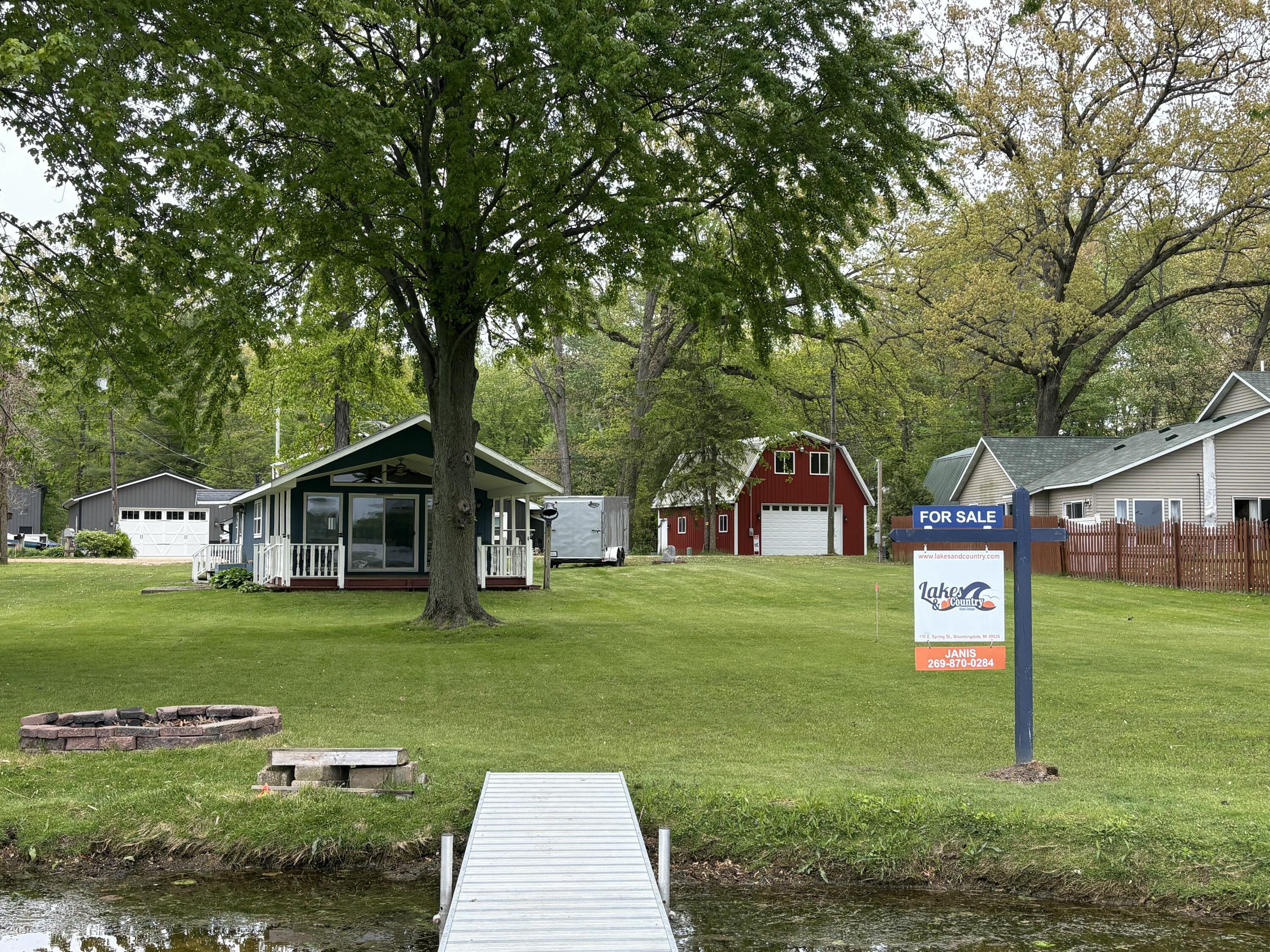3055 Baseline Road Gobles, MI 49055 - Photo 27 of 53 House and barn from the dock