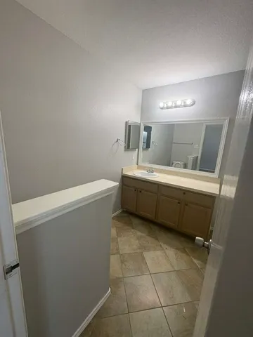 a utility room with a washer dryer and a washer