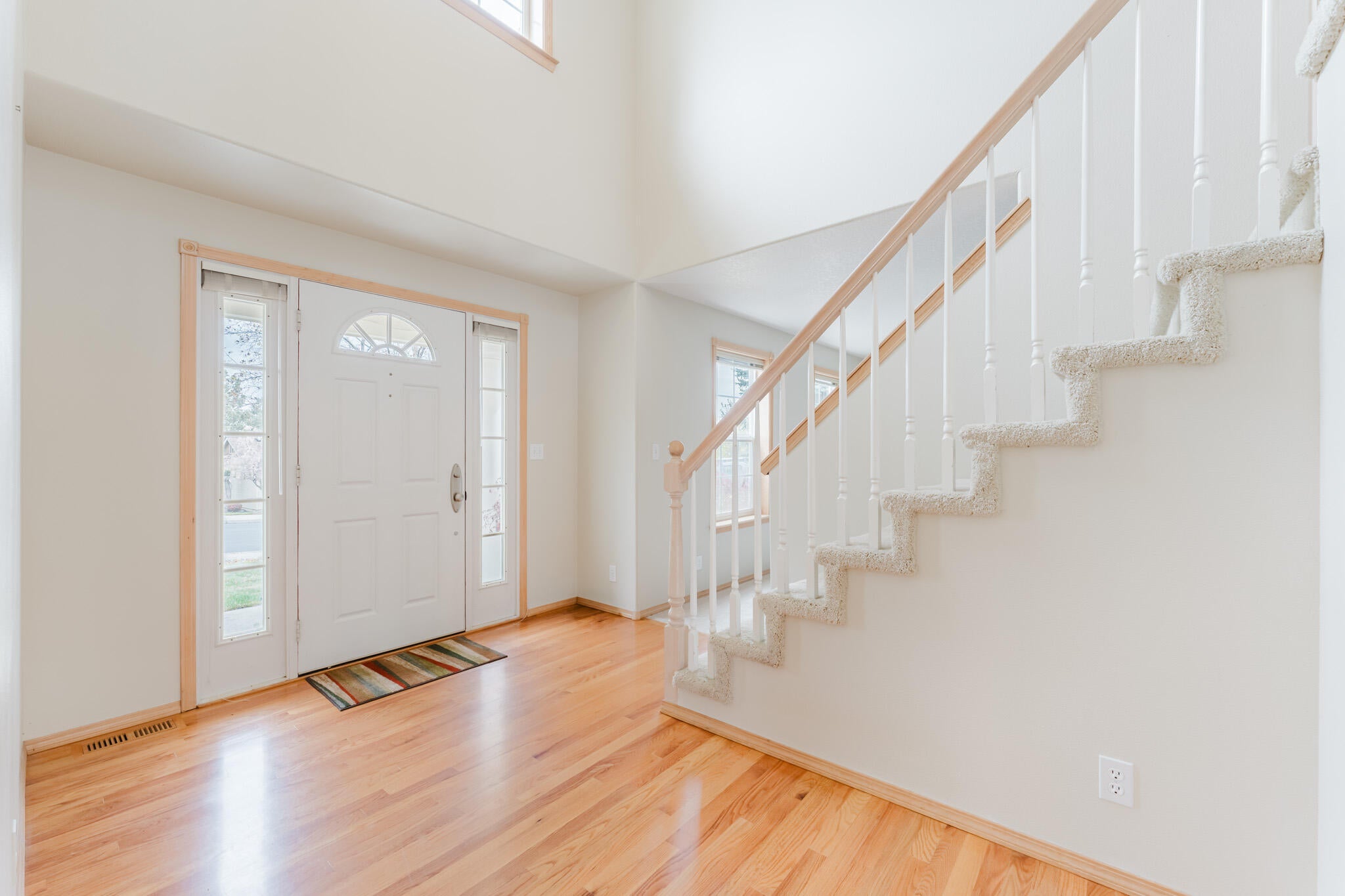 3626 Southwest Volcano Court Redmond, OR 97756 - Photo 3 of 89 Hardwood floors in the entry and the staircase to the upstairs.