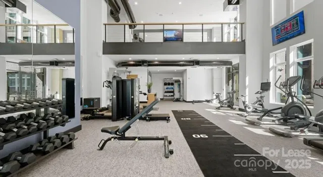 a view of a room with gym equipment
