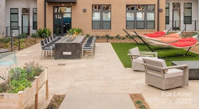 a building outdoor space with patio furniture