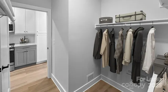 a kitchen with cabinets a sink and appliances