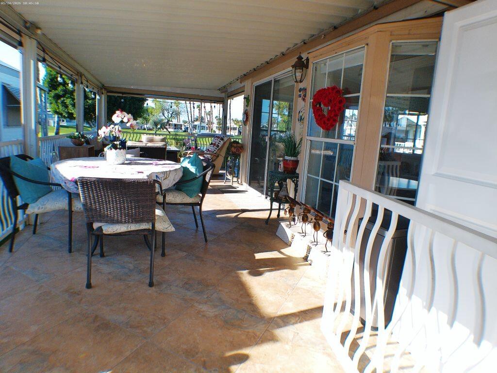 84136 Ave 44, Unit 262 Indio, CA 92203 - Photo 16 of 60 a view of a dining room with furniture window and outside view